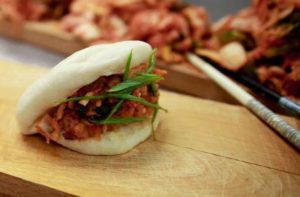 El Super Pan's pork belly bun, a fusion of Spanish-Caribbean and Korean cuisine