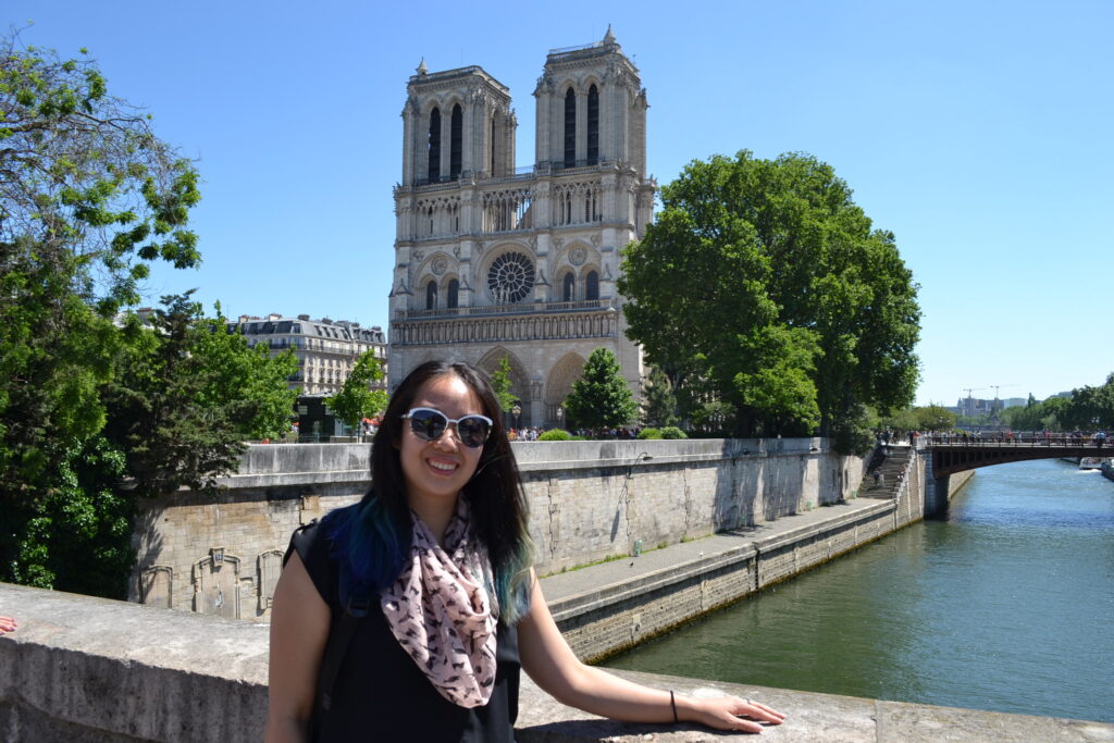 Melissa Ting in front of Notre Dame in Paris, France